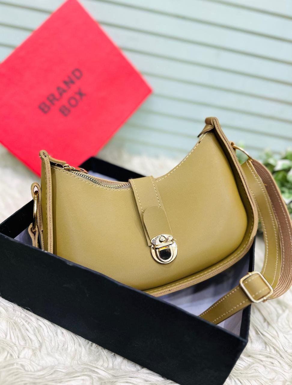 The Crescent Lock Shoulder Bag