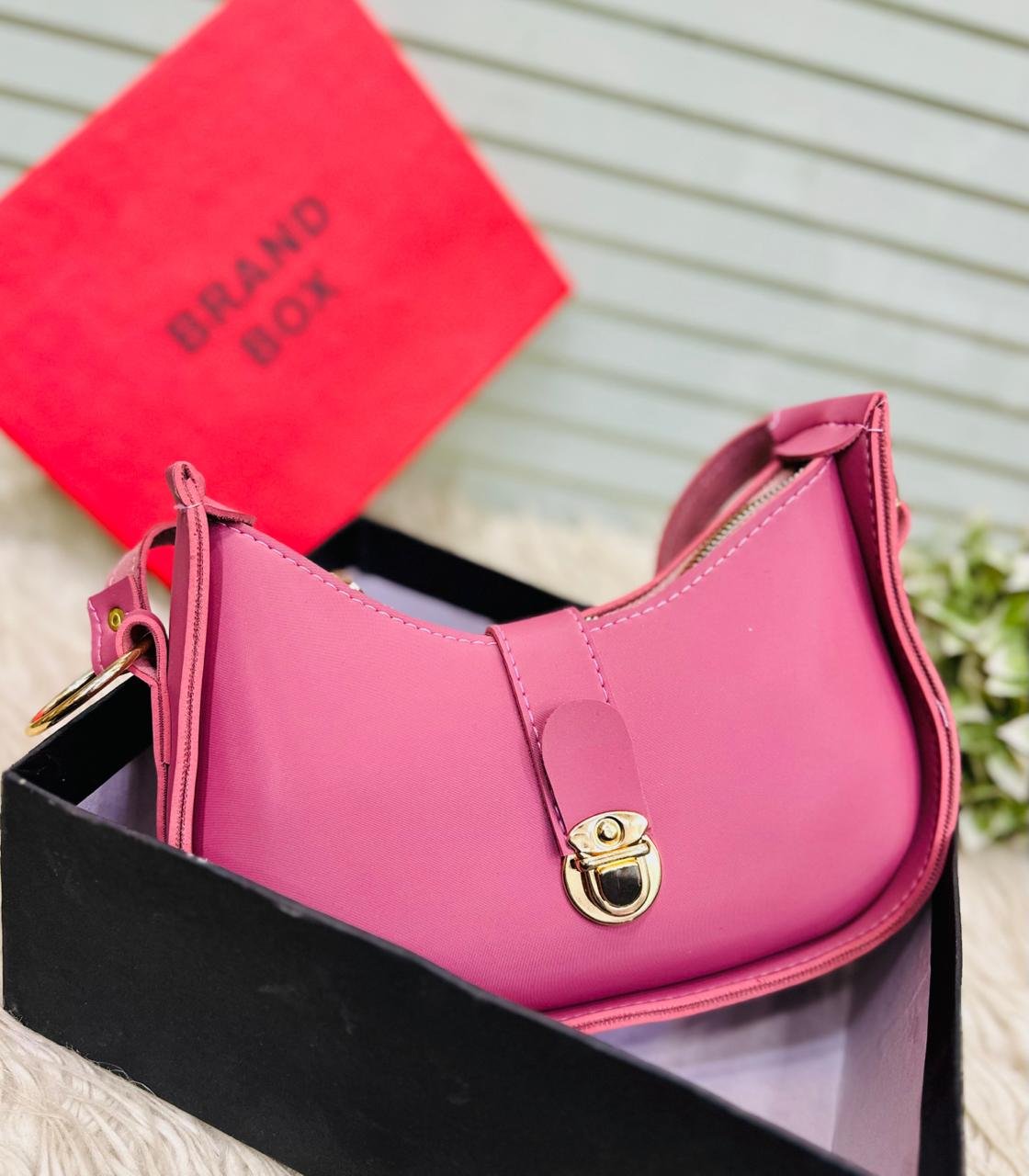 The Crescent Lock Shoulder Bag